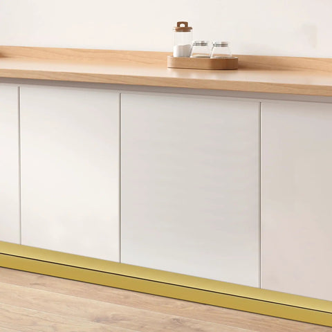 Top Tier Matte Gold L Shaped Corner Guards Peel And Stick Molding Trim For Furniture Edge Bumper Table Door Frame Protector No Sweat Diy Installation Smooth Vibe Check For Any Crib Upgraded Room Makeover At Sixteen Feet Long on a white cabinet.