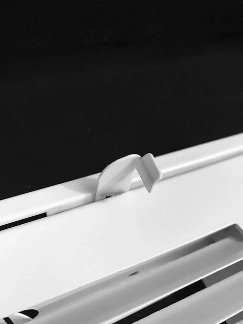 Close-up of latch on Fits 16x25 Duct Opening Return Air Grille With Filter Included And Removable Door Steel White Vent Cover