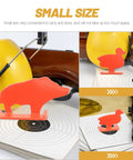 Four Piece Gun Target Set With Animal Silhouette Targets in neon orange stainless steel resting on target sheet