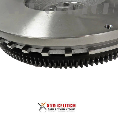 AMC Stage 3 Clutch Kit And Flywheel For 2007 2011 Jeep Wrangler 3 8L V6 OHV Beefed Up Upgrade Set With OEM Quality Components Made In The USA And Backed By Expert Support. steel flywheel close-up