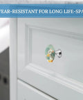 Sweet Mouse Passing Cheese Round Drawer Cabinet Knobs Built With Solid Stainless Steel Base And Glossy Crystal Exterior Dope Two Piece Handle Pulls To Level Up Your Dresser Or Kitchen Setup on white cabinet.