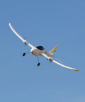 RC Airplane Duet S 2 Ready To Fly Starter Kit With Everything Included, All In One Pack For Beginners To Get Flying Quickly And Safely, HBZ05300 For Instant Fun in flight outdoors, showing full wingspan against clear sky.