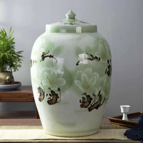 Slay Your Pantry Game With This Knockout Green Ceramic Rice Jar Featuring Hella Secure Airtight Lid Perfect For Stashing Cereals Grains Coffee Or Tea Straight Up Classic Decor. Green ceramic rice jar with floral design, airtight lid, ideal for food storage.