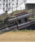 Close-up of 2 Pack Black Tube Barrel Mount Holder For Flashlight And Laser Torches With Hex Wrench Aluminum Alloy on rifle
