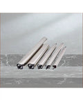 Heavy Duty Stainless Steel Conveyor Rollers 5 Piece Set on a surface, showcasing different lengths and robust design for industrial use.