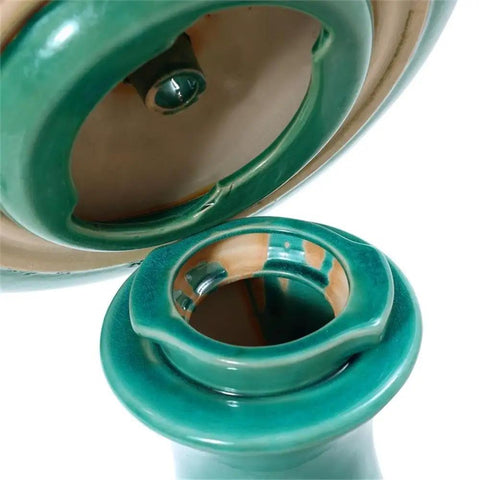 Close-up of 22 Inch Ceramic Bird Bath Fountain With Lotus Design showcasing base and bowl connections, Aqua Green, weather-resistant.
