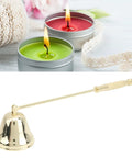 Slick Stainless Steel Candle Snuffer With Ergonomic Long Handle And Hassle Free Wick Control For Tapered Dinner Candles And Fresh Home Decor Setup In Classic Gold Finish next to lit green and red candles.