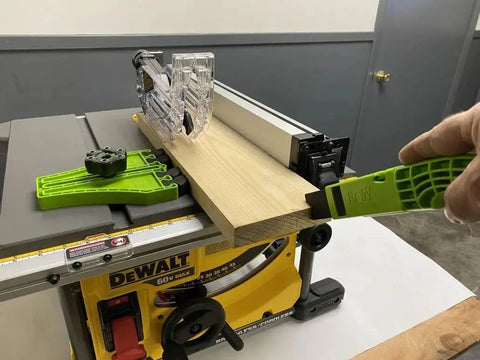 Mini PushPRO PP2 Push Stick For Table Saws With EVA Tip in woodworking action on yellow table saw.