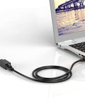 Laptop connected using 2 Pack Gigabit RJ45 In-Line Ethernet Couplers Female To Female Extender Adapters For Cat5e To Cat8 Cabling Plug And Play Nickel Plated Contacts Black Cables