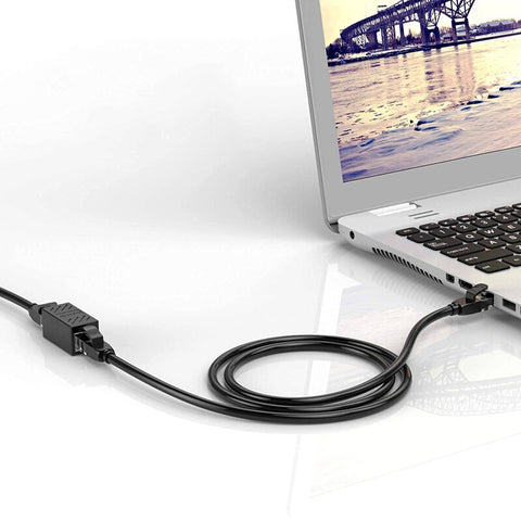 Laptop connected using 2 Pack Gigabit RJ45 In-Line Ethernet Couplers Female To Female Extender Adapters For Cat5e To Cat8 Cabling Plug And Play Nickel Plated Contacts Black Cables