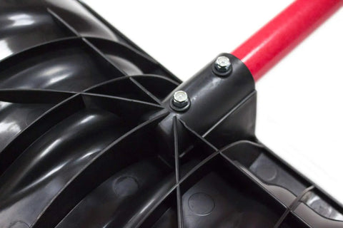 Close-up of Beast Of A Snow Shovel With Wide Scoop And Fiberglass D-Grip showing heavy-duty steel blade and red fiberglass handle