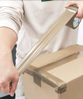 Person using Brown Packing Tape With Dispenser 2.4 Mil Thick 1.88 Inch Wide By 60 Yards 6 Rolls Total Free Dispenser Included