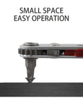 Heavy Duty Chrome Vanadium Steel Workhorse Mini Ratchet Wrench Kit Featuring Bidirectional Quarter Inch Square Drive Hex Socket Adapter And Quick Change Bits Shop Ready, close-up on tool in tight space.