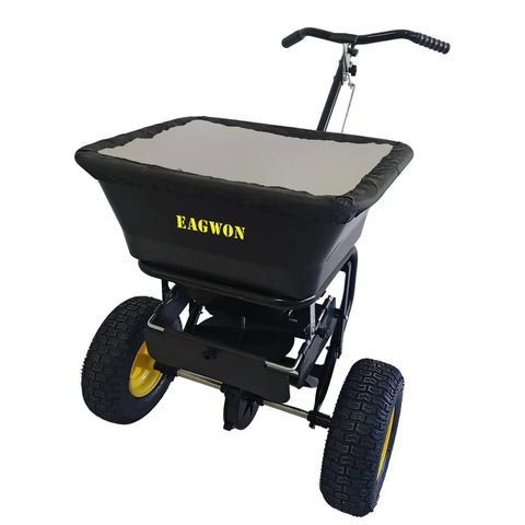 Pro Grade Walk Behind Broadcast Spreader For All Season Lawn Care And Commercial And Residential Use With 100Lb Hopper And 13 Inch All Terrain Pneumatic Tires Enclosed Gearbox Grate Cover Spreads Seed Fertilizer Salt And Snow Melt Across Large Areas