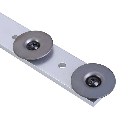 Close-up of duct stretcher tool for HVAC installations and repairs with metal washers on a metal sheet for precise ductwork stretching