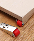 Top Shelf Set Of Four Stainless Steel Cabinet Door Rollers Paired With Heavy Duty Galvanized Track And Durable Plastic Gliders For Smooth As Butter Bottom Casters featuring red plastic gliders and stainless steel components.