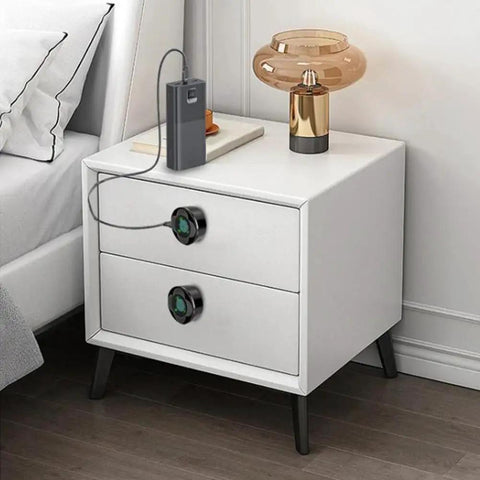 Slick Smart Drawer Fingerprint Lock With Lightning Fast Unlock And No Sweat Charging For TV Console Bedroom Nightstand Shoe Rack And Office Locker in use on a white nightstand.