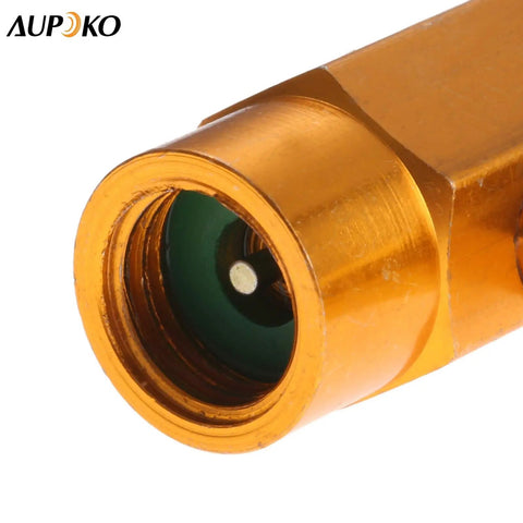 Close-up of DIY Car AC Recharge Kit With Gauge And 1/2 Inch Self Sealing Valve Can, metal valve component visible