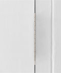 Close-up of a heavy duty piano hinge set for wooden boxes and jewelry boxes, installed on a cabinet door.