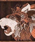 Framed wooden wall art of a stylized bear head with layered leaf motifs in brown tones.