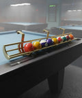 Solid Gold Billiard Ball Rack And Pool Organizer Tray wall mount with pool balls organized, attached to a table edge.
