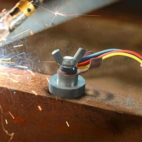 Heavy Duty Magnetic Welding Ground Clamp With Copper Tip For Secure Flat Or Curved Metal Workpiece Fix Fast And Stable Electrical Connection on metal surface with sparks.