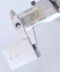 Detailed view of 100 Pieces Door Frame Corner Fixer And Installation Bracket Set Stainless Steel with thickness measurement