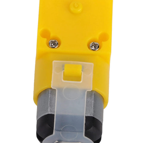 48mm mecanum wheel module for TT geared motor in yellow housing; black/gray wheel and translucent plug (close-up)