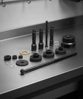 Beast Mode Heavy Duty Motorcycle Bearing Puller And Wheel Extractor Installer Tool Kit Built From Strong Carbon Steel With threaded pull rods, washers and nuts on bench