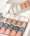 Six Piece Plastic Underwear Organizer Box For Drawer Dividers And Sock Keeper, neatly arranged socks in dresser organizer.