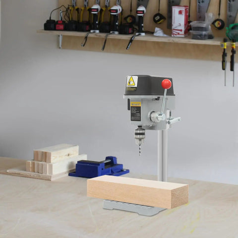 Sturdy Mini Bench Drill Press For Woodworking And Metal Crafting, compact size, drilling into wood, ergonomic design in workshop setting.