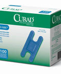 Top Shelf Blue Knuckle Bandages Featuring Internal Metal Detectors Designed For Food Industry High Visibility Nonstick Pads Gentle Yet Reliable Adhesive 100 Count Pack in a green box.