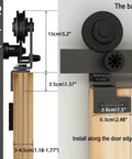Close-up of Heavy Duty Bi Folding Sliding Barn Door Hardware Kit For Two Doors 3 Foot Track 36 Inch Frosted Black Carbon Steel.