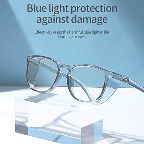 Clear glasses on a stand with text 'Blue light protection against damage', related to Three Pack Safety Glasses For Men And Women Comfy Lightweight Anti Fog Goggles With Side Shields In Pink Black And Blue Practical Eye Protection For Nurses And Healthcare Pros.