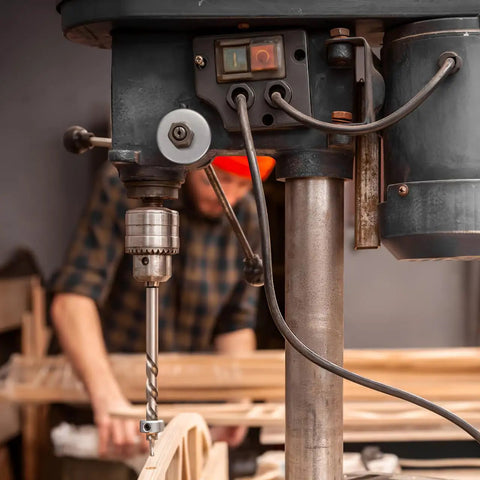 Drill Press Return Spring Set For Quill Coil Assembly Bench Drill Press Replacement Part in use with steel drill bit in workshop