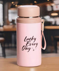 Pink 800ml insulated water bottle with text 'Lucky Every Day', featuring a handle, suitable for gym and travel.