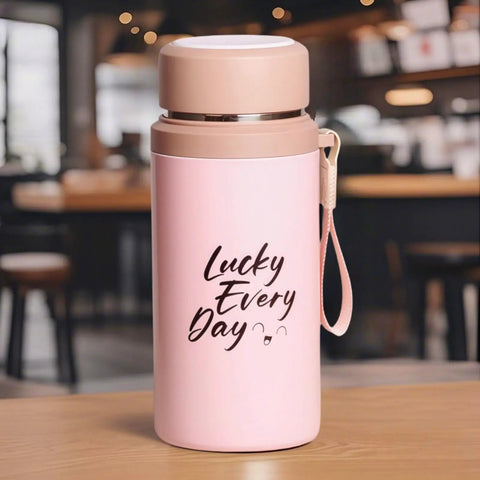 Pink 800ml insulated water bottle with text 'Lucky Every Day', featuring a handle, suitable for gym and travel.