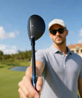 Man holding 21 Degree Hybrid Golf Club for Maximum Forgiveness and a Big Sweet Spot, focus on club head, golf course background