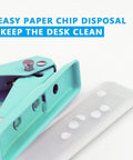 Close-up of green Grab And Go Handheld One Quarter Inch Hole Punch for up to twenty sheets with skid resistant base and paper chip disposal