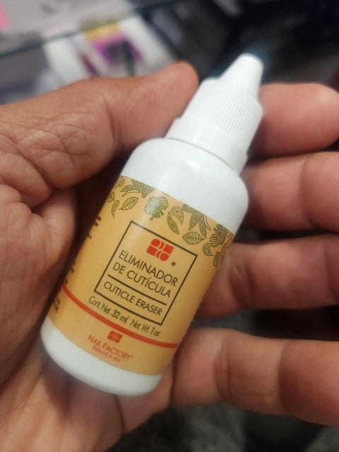 Cuticle Remover Liquid 32ml For Manicure And Pedicure At Home Nail Care Soften Cuticles Quickly With A Gentle Fast Acting Formula For Pro Quality Nails You Can Push Back Easily And Keep Your Hands Looking Fresh., white bottle with dropper cap in hand