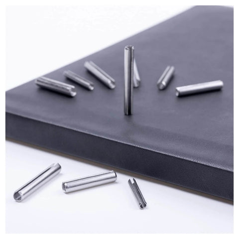 120 Piece Spring Pin Kit In 5 Sizes 304 Stainless Steel Slotted Roll Pins GB879 scattered on black surface