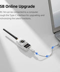 ELRS Nano 2.4GHz Long Range FPV Transmitter Module 1W Boost plugged into laptop via USB for upgrade