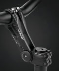 Adjustable Bike Stem Riser And Handlebar Extender for 31.8mm Bars, black, on a bicycle handlebar; allows angle adjustment.