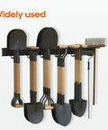 Wall Mount Garage Storage And Garden Tool Organizer With 350 Pound Capacity Adjustable Steel Rails And 6 Rubber Coated Hangers Rustproof Carbon Steel Rack For Garage Shed And Outdoor Tools shown with tools hung.