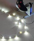 Foot pedaling on Pedal Power Generator With Dual USB Fast Charge And DC Jack Foot Crank Charging Station for home use.