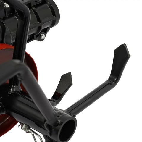 Close-up of black metal claw wheel attachment of All Purpose Cultivator Garden Tool Workhorse With 6 Claw Wheel 2 In 1 Weeder And Soil Aerator.