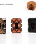 Set of three decorative cigar cutters with V-shaped guillotine design and unique patterns for stylish cigar trimming.
