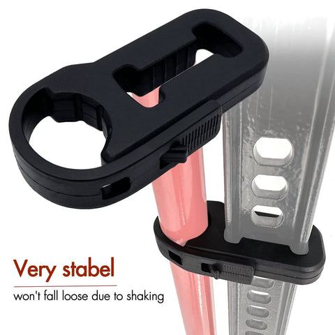Jack handle keeper clamp in black plastic, shown securing pink Hi-Lift jack handle to a metal jack rail.