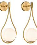 Lit Mid Century Modern Wall Sconces Set Of 2 With Globe Glass Shades In Antique Brass Finish