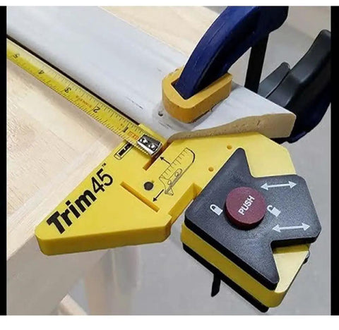Trim 45 Trim Carpentry Aid Handheld Gauge for finishing door and window trim with adjustable reveal setting clamped on wood.